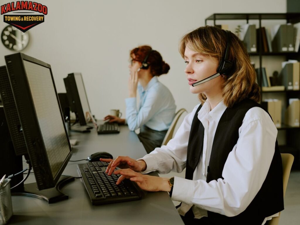 Tow operator providing roadside assistance near US-131 exit in Kalamazoo MI